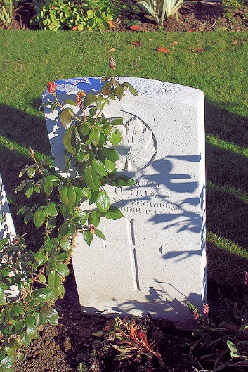 A tombstone with a rose growing on it AI-generated content may be incorrect.